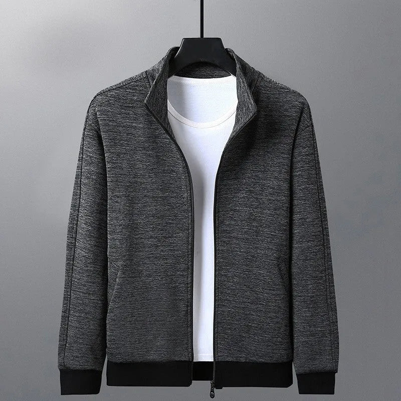 Men's black stand-up collar zip-front jacket in an athletic fit on a hanger.
