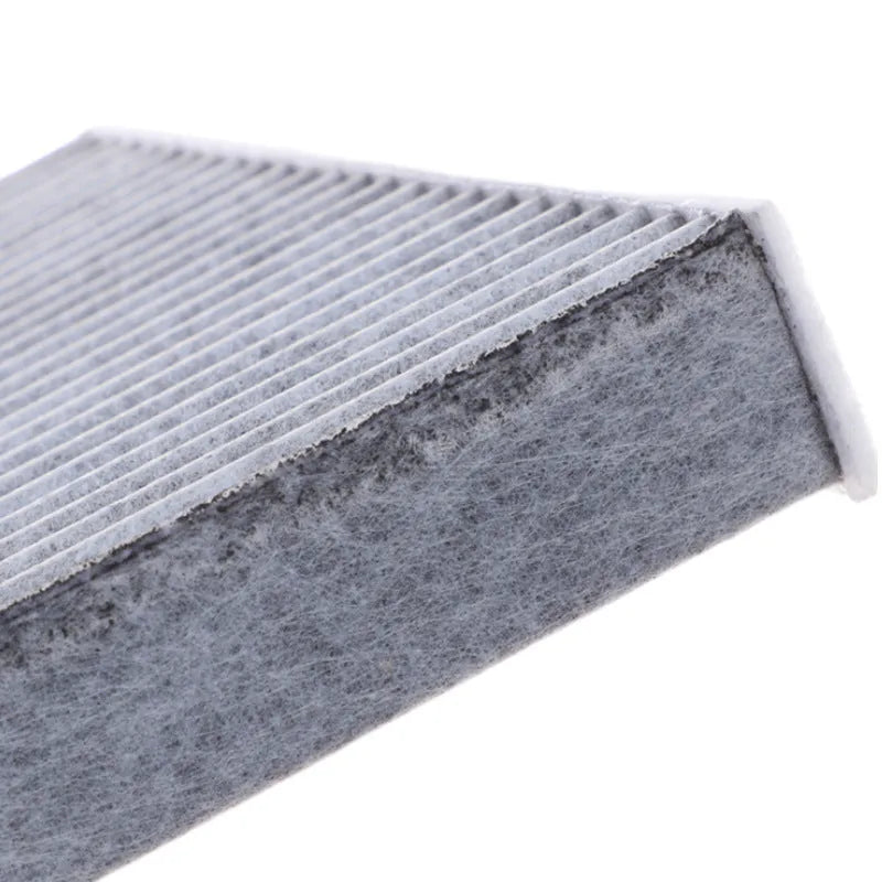 Grey Geely car air conditioning filter element measuring 215mm by 210mm by 30mm.