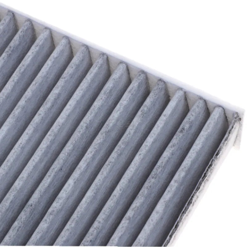 Grey Geely car air conditioning filter element measuring 215mm by 210mm by 30mm.