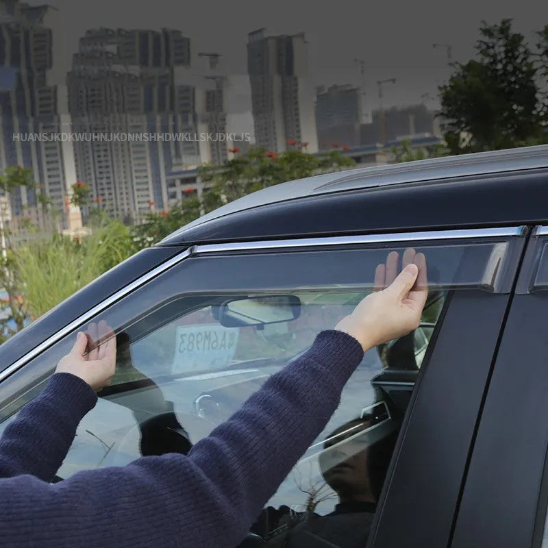 2023 Outlander window deflector set in engineering plastic showing black and translucent options