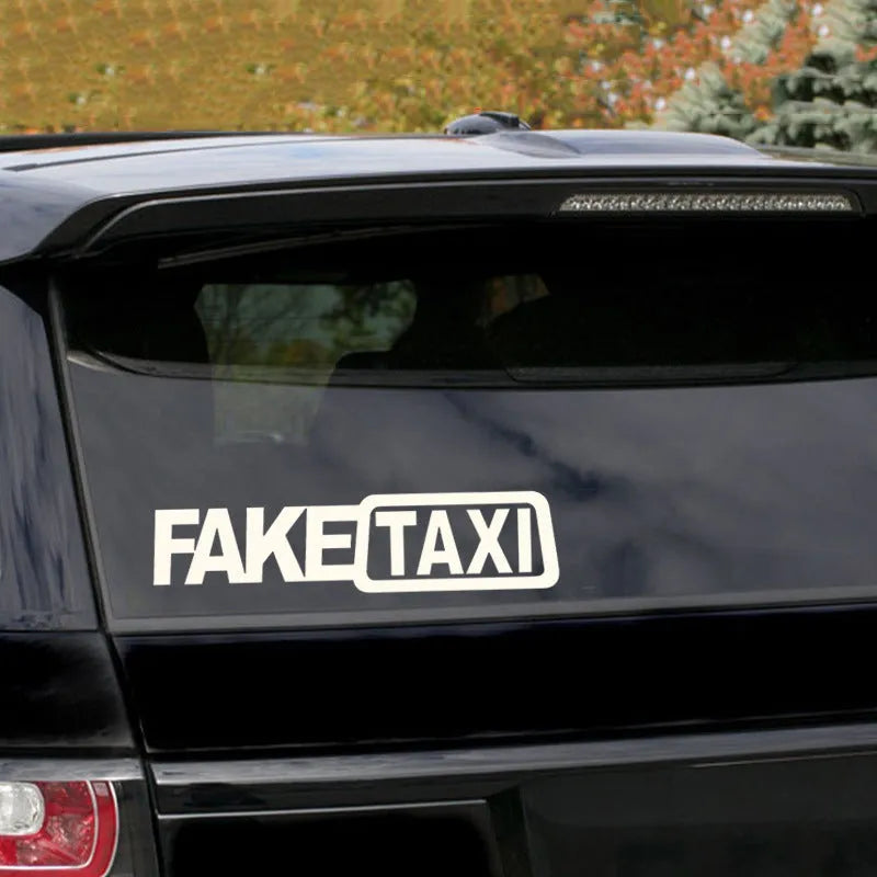 FAKE TAXI black car warning sticker measuring 20cm by 8cm