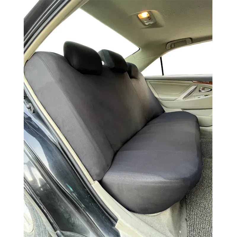 Polyester car seat cover with eyelet stitching in a choice of colours, showing sponge padding construction.