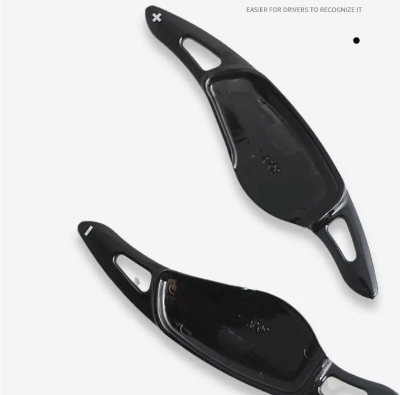 Carbon fibre steering wheel shift paddle in ABS plastic showing five colour finish options