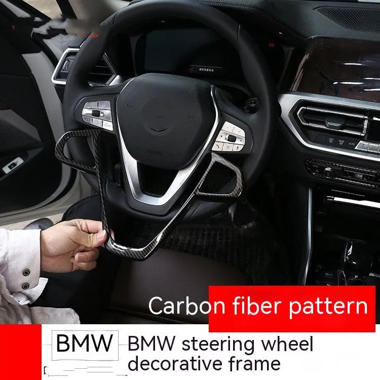 BMW steering wheel button frame decoration with carbon fibre pattern finish