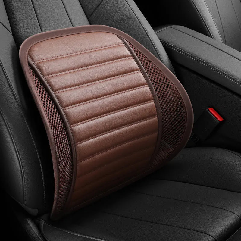 Memory foam lumbar support cushion with PU leather cover in sapphire blue, placed on a car seat.