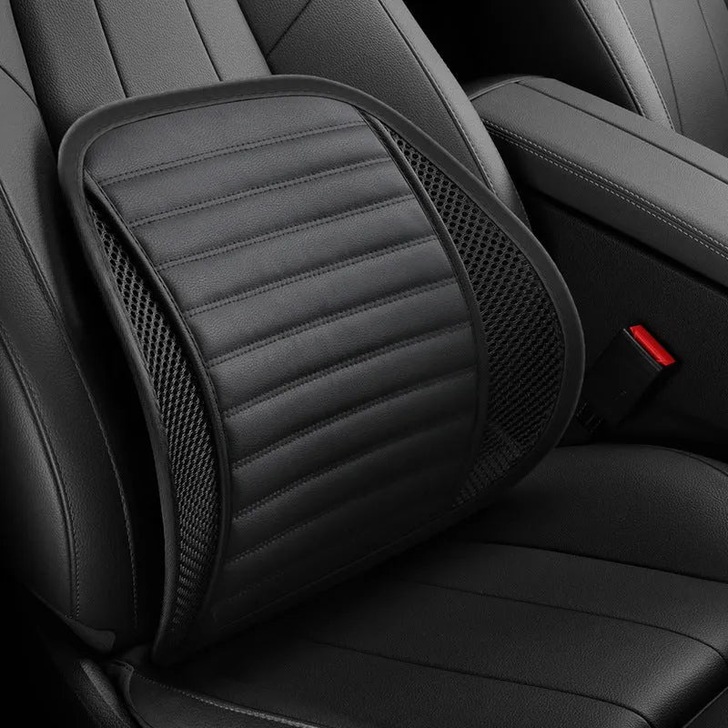Memory foam lumbar support cushion with PU leather cover in sapphire blue, placed on a car seat.