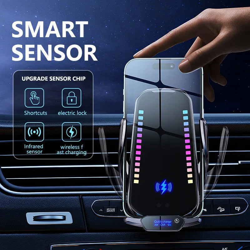 Silver car mobile phone holder with wireless charging dock mounted on a car air vent.