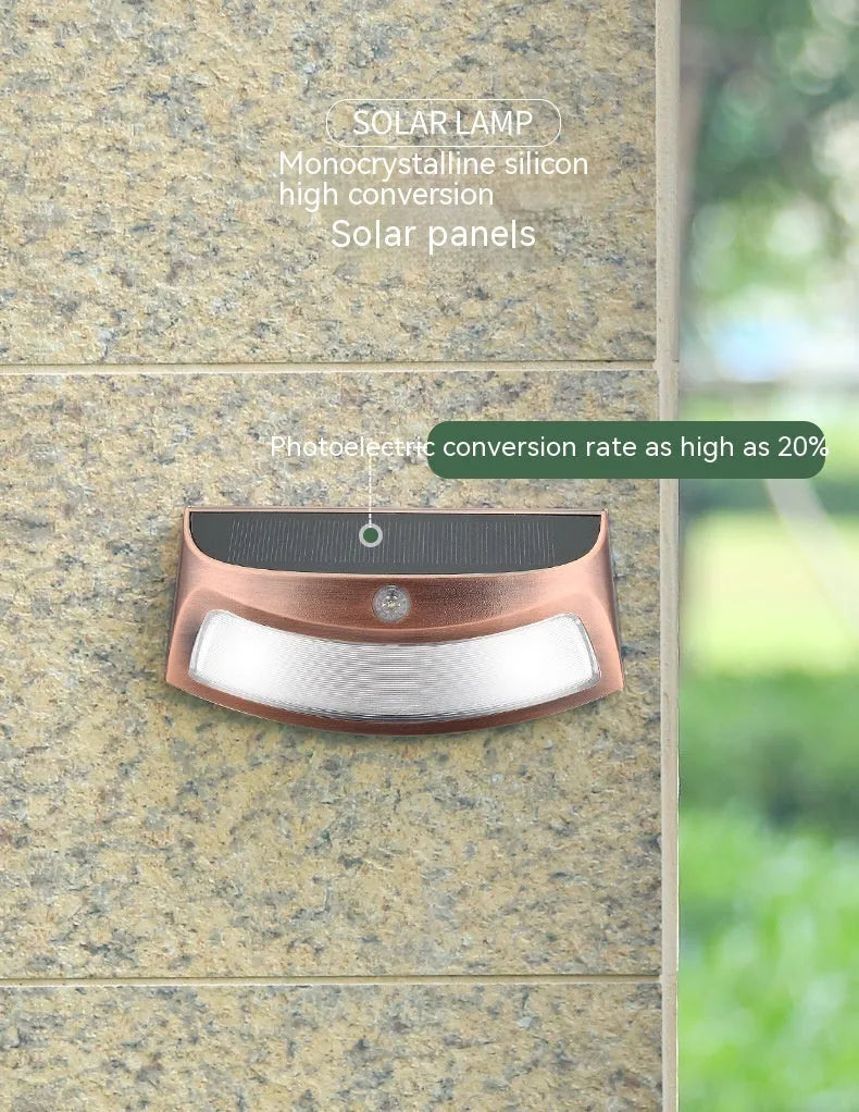 Solar-powered smiling face garden wall light with IP65 weather protection for outdoor courtyard and villa lighting