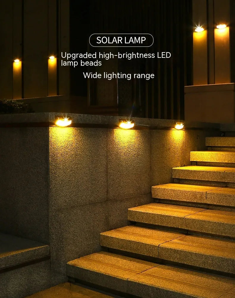 Solar-powered smiling face garden wall light with IP65 weather protection for outdoor courtyard and villa lighting