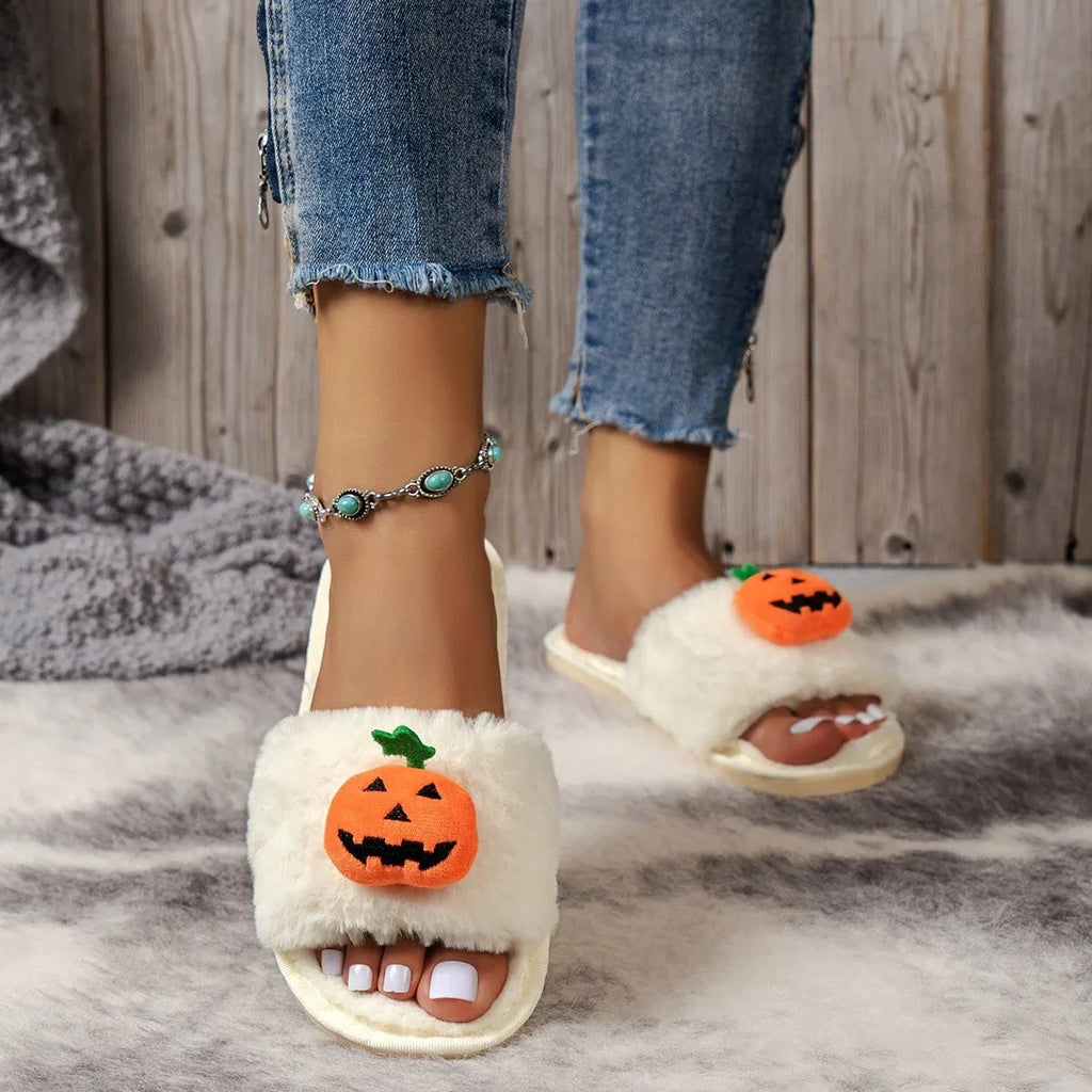 Women's Halloween pumpkin plush slippers in white and yellow with synthetic fur upper