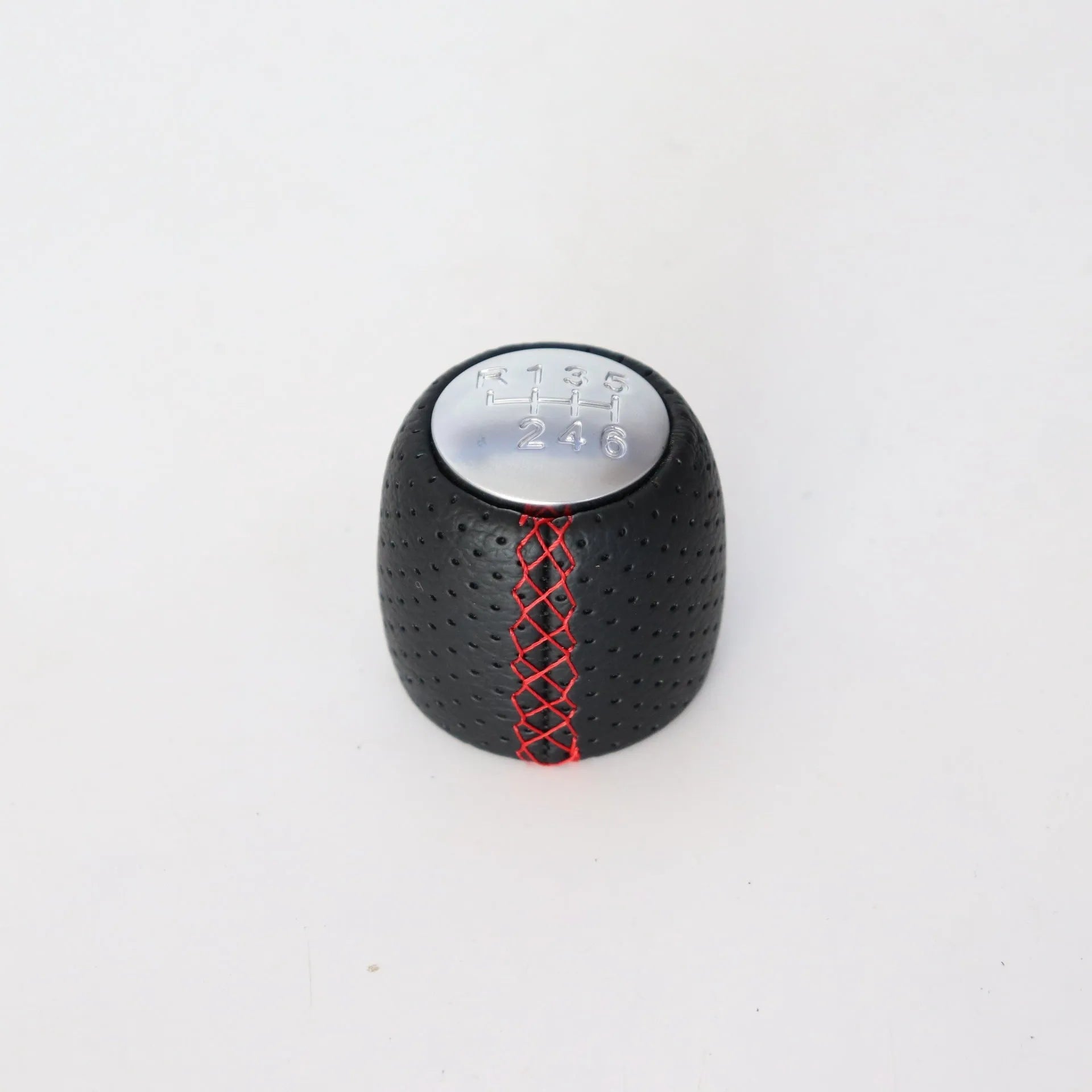 Black leather handball gear with perforations for Alpha car, shown with silver and matte cover options.