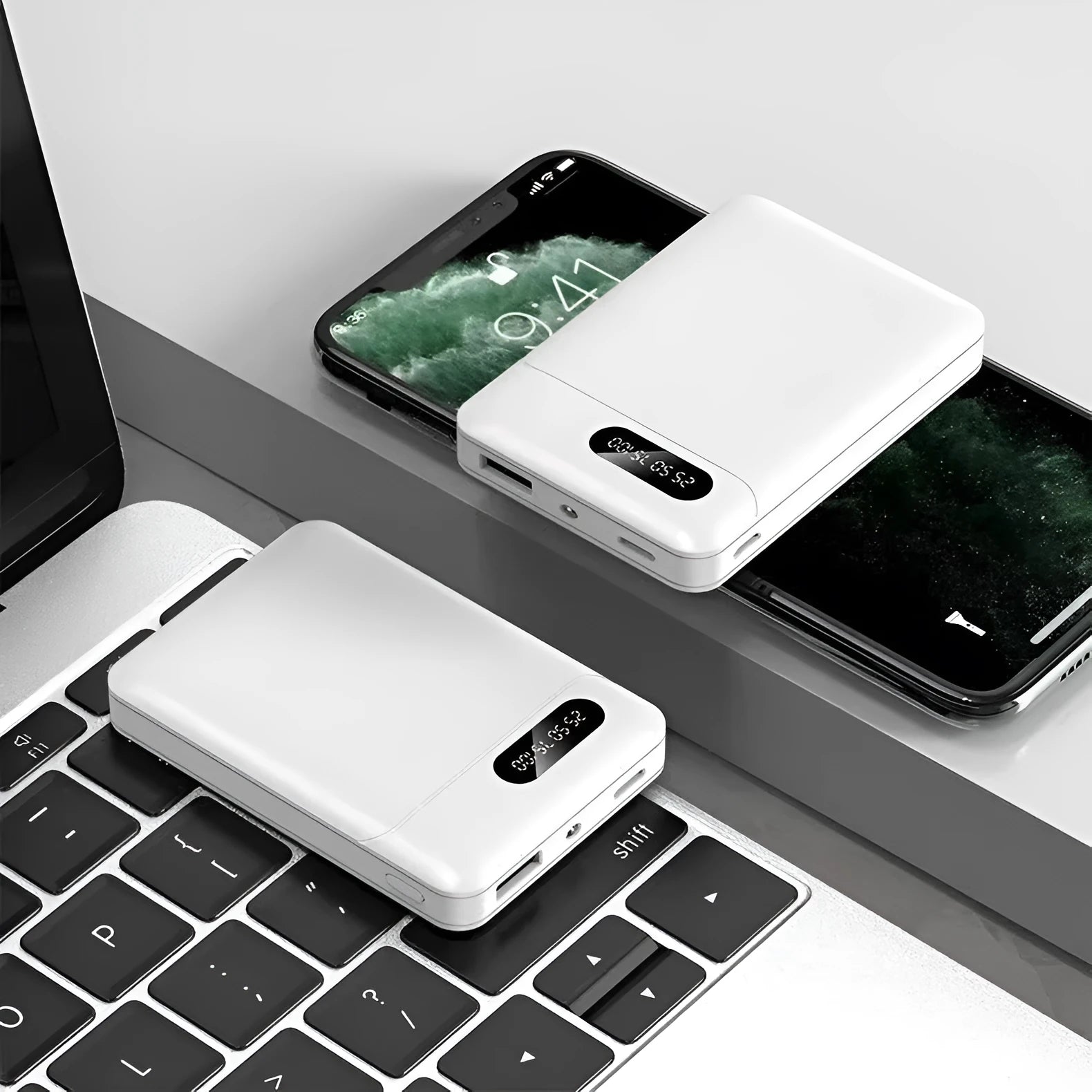 Black and white portable power bank with multi-U charging ports for smartphones and tablets