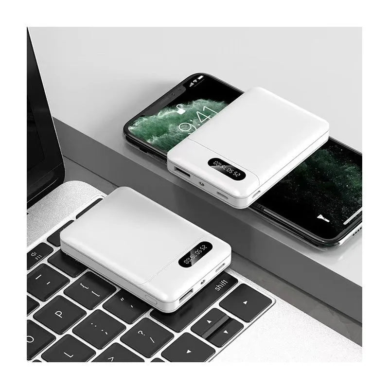 Black and white portable power bank with multi-U charging ports for smartphones and tablets