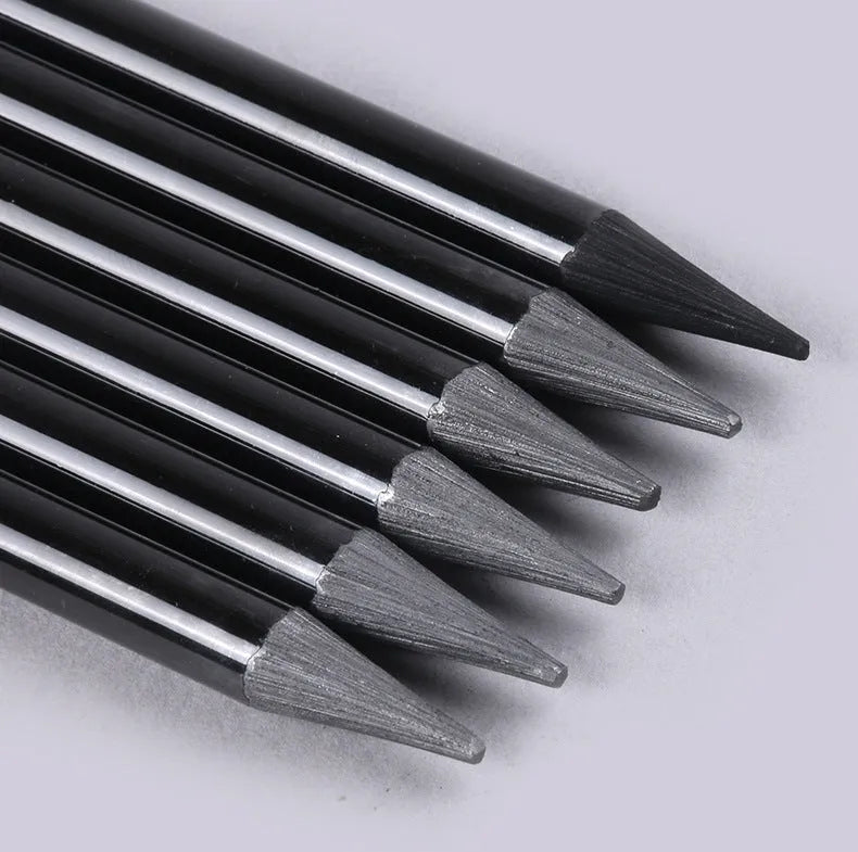 Wooden graphite and carbonized drawing pencils for artists on suction card packaging