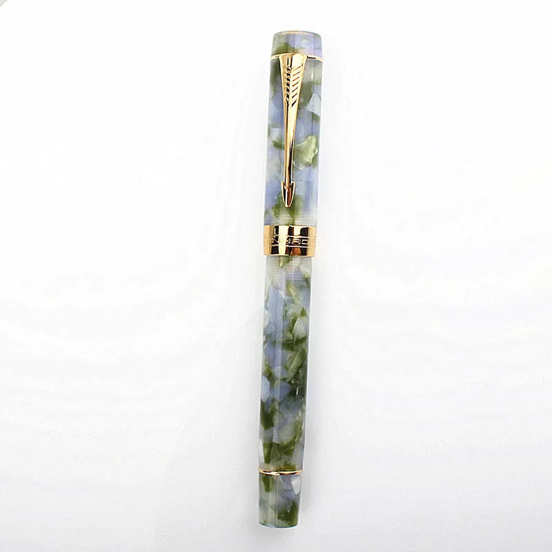 Deep bath green metal pen showing fine, medium, and broad tip size options.
