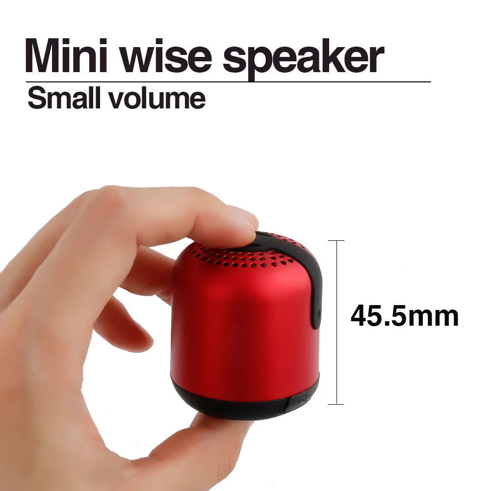 Hieha XQ11 mini Bluetooth speaker with heavy metal design in black, showing compact size and 360 degree sound capability