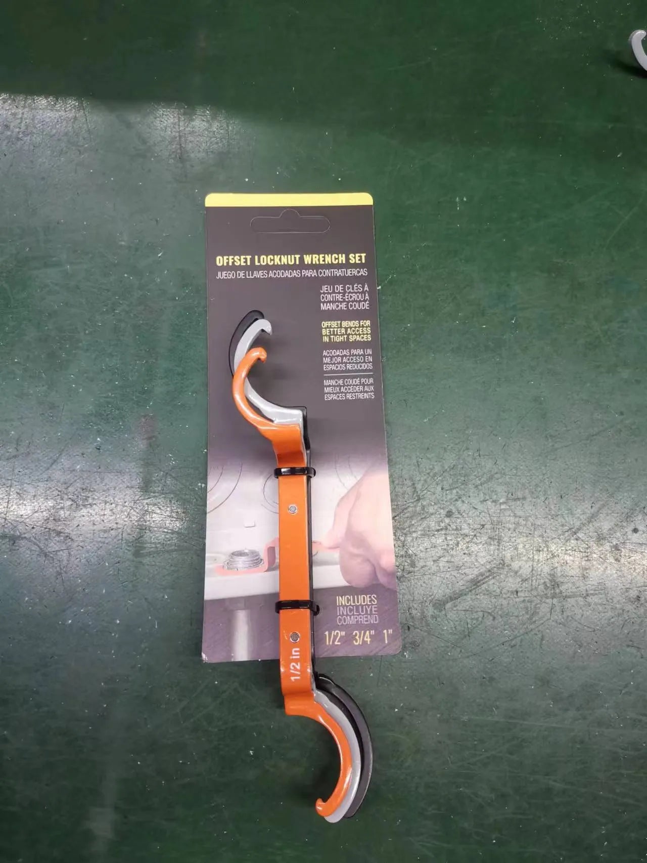Three-piece magnetic suction wrench set in orange, grey, and black with catheter locking mechanisms