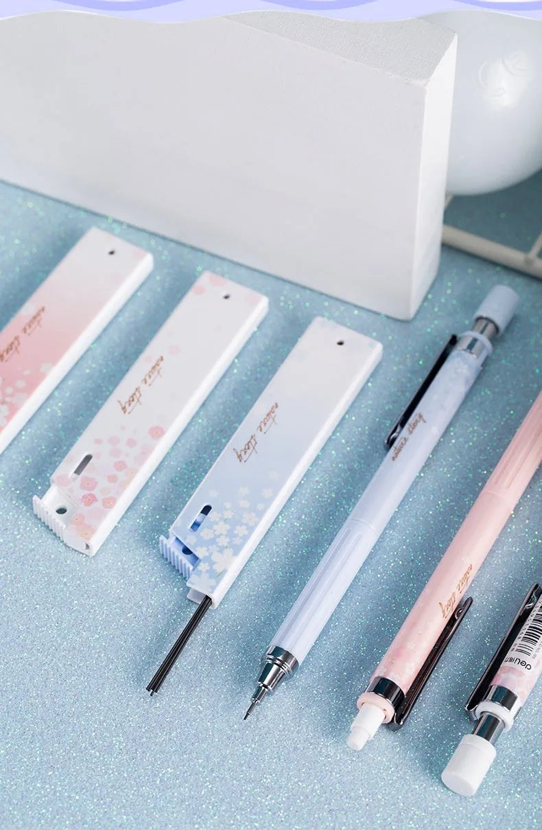 Sakura-themed automatic mechanical pencil set with three 0.5mm pencils and refill boxes