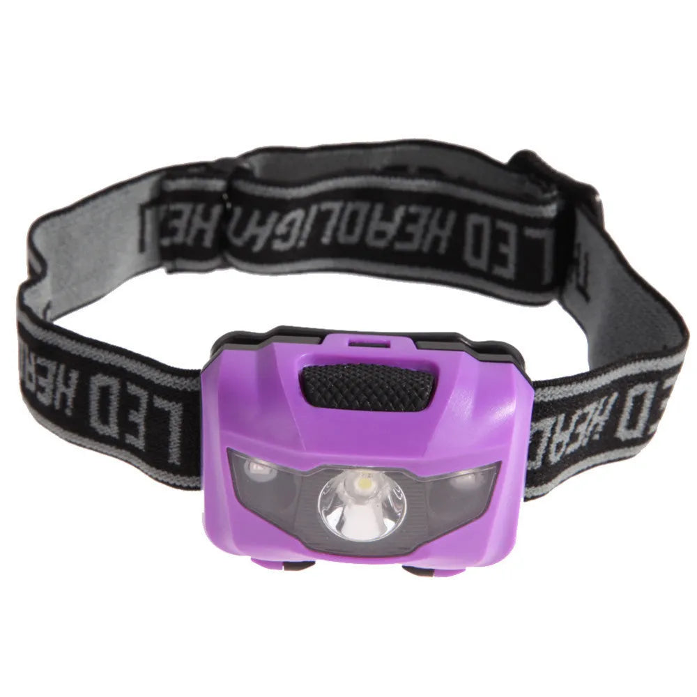 Black waterproof head torch with white and red LEDs mounted on adjustable headband for outdoor use.
