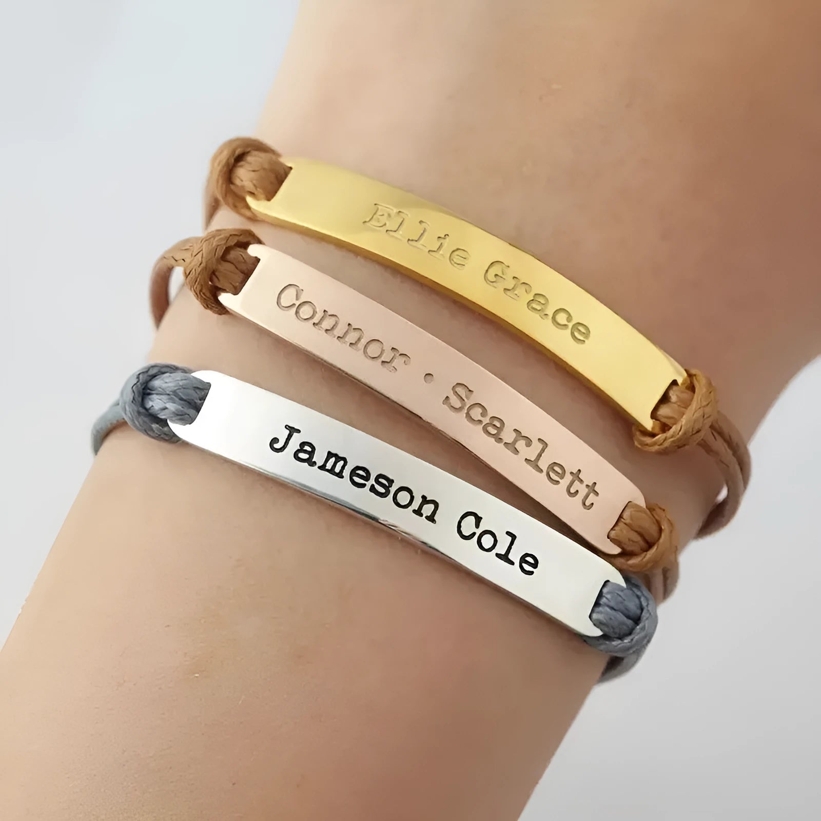 Stainless steel curved inspirational engraved woven stretch wristband in rose gold finish with synthetic leather band
