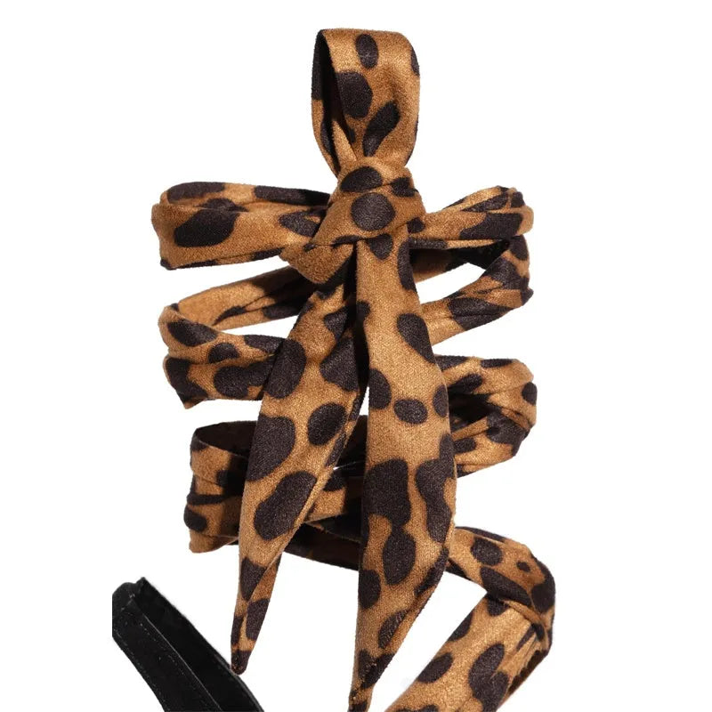 Light brown leopard print Roman-style stiletto heels with cross straps and super-high 8cm heel