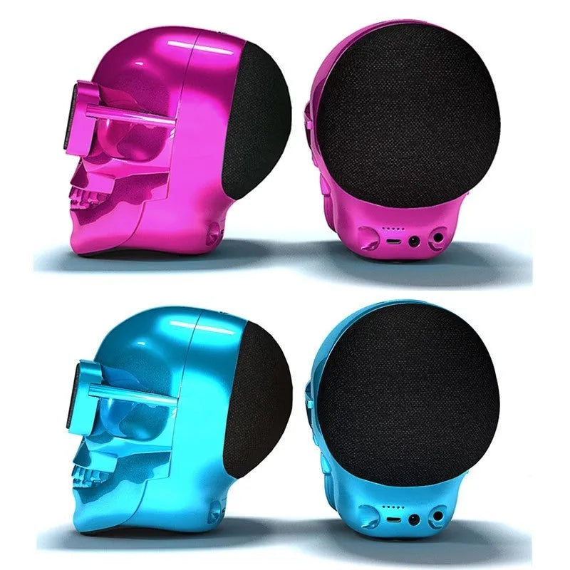 Skull-shaped wireless Bluetooth speaker showing front view with controls and available colour options