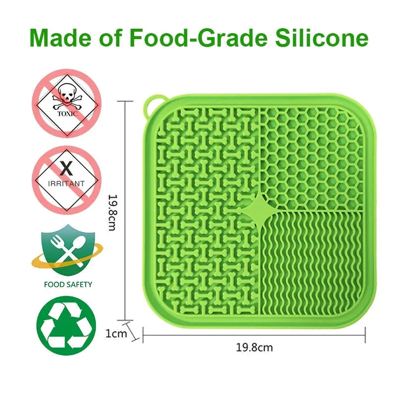 Square orange-red and grey silicone dog lick mat with textured surface and suction cups on the back.