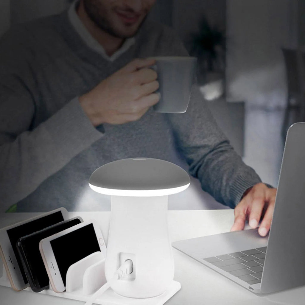White 5-port USB charging dock station with integrated mushroom-shaped LED night light on a desk