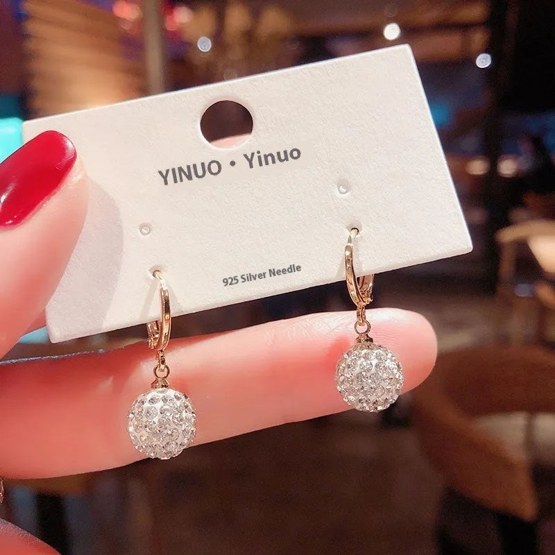 Geometric rose detail zircon earrings for women in copper, available in multiple colours.