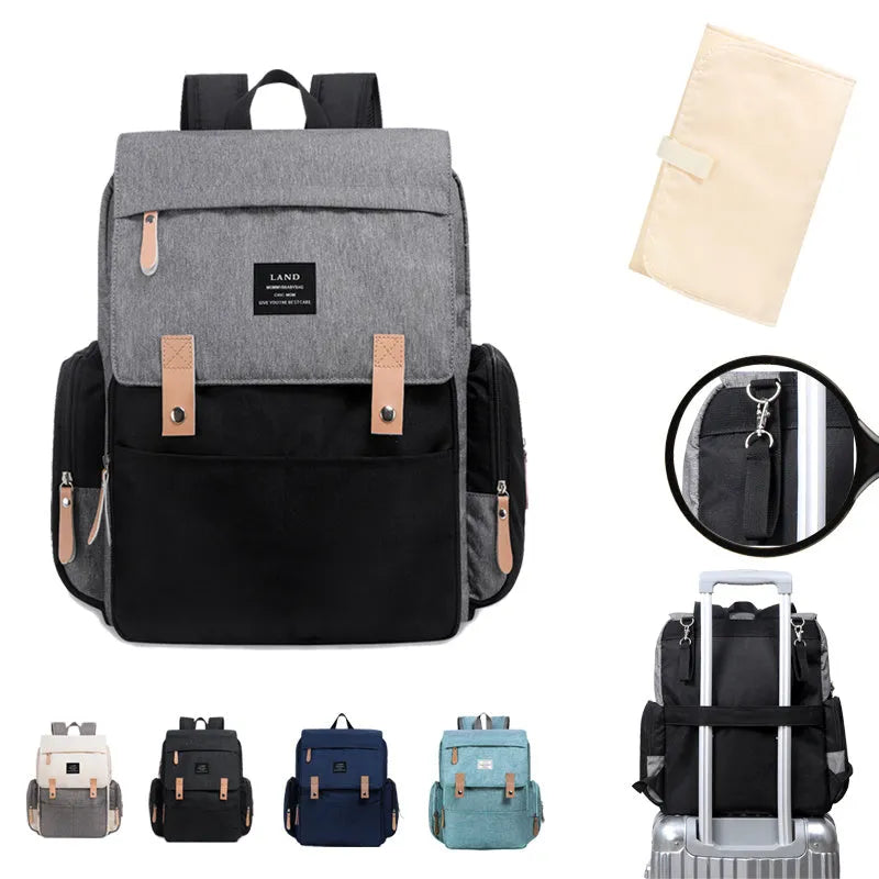 LAND Mommy Diaper Bag Backpack in oxford cloth with changing mat, shown in beige colour.