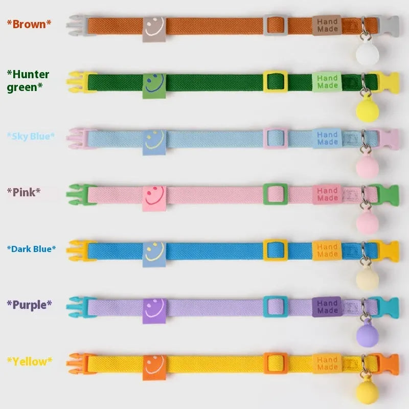 Small dog elastic polyester pet collar shown in seven colour options with adjustable 22-32cm sizing