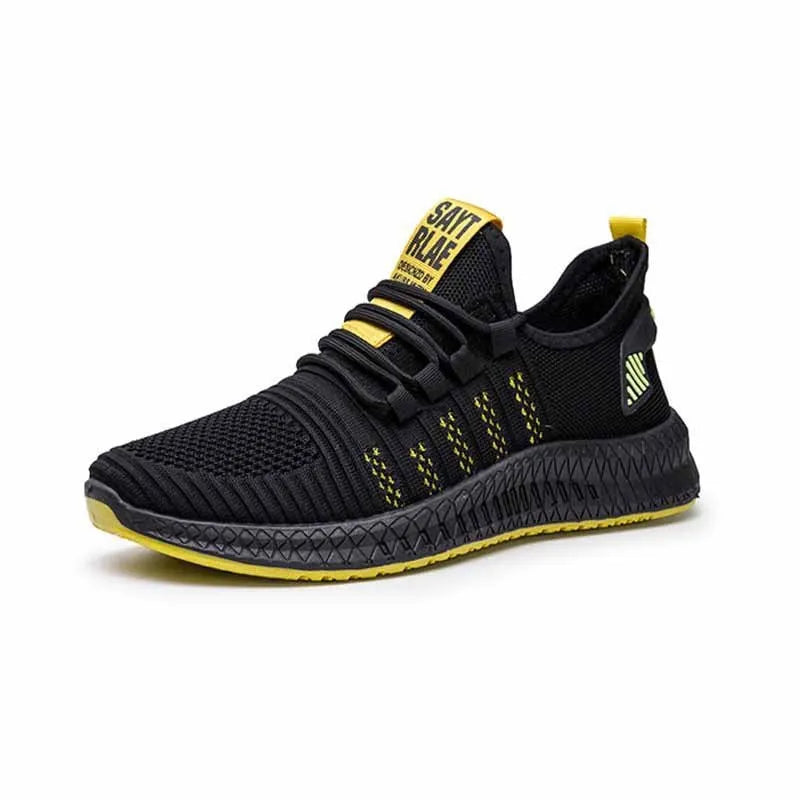 Men's black casual trainers with cross-strap design over striped pattern and Flying Weave fabric upper