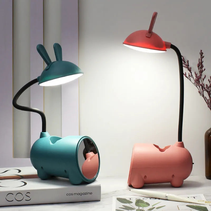 Cartoon-style plastic desk lamp with built-in pen container in dark blue colour