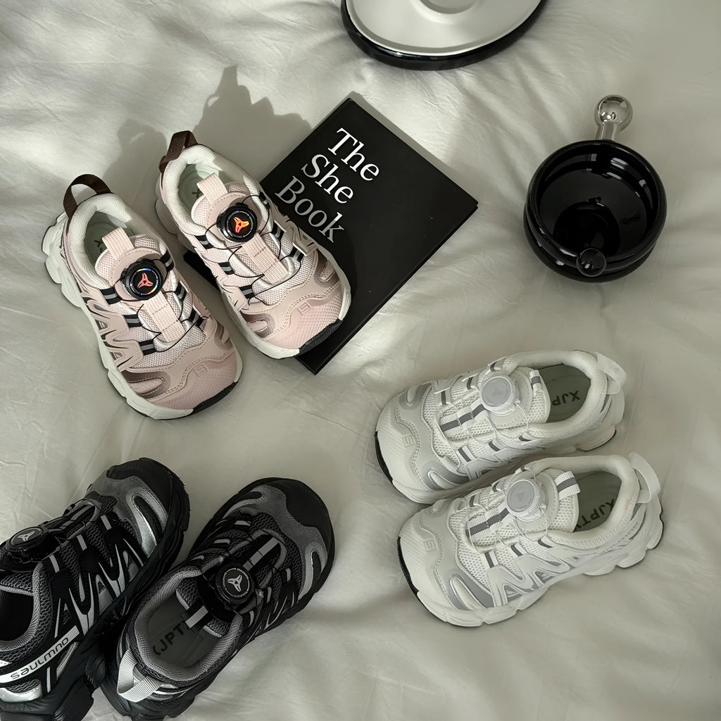 Girls lightweight casual sneaker in breathable mesh, available in black, beige, or pink.