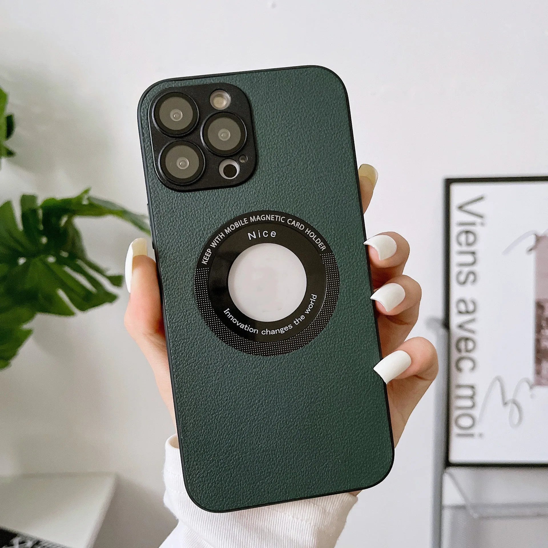 iPhone 15 Pro litchi grain leather magnetic suction phone case in black showing back cover texture