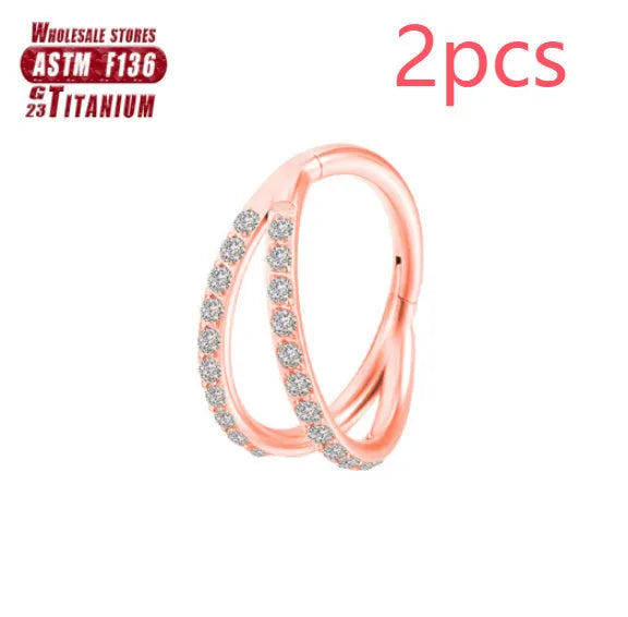 Titanium alloy nose ring in silver, available in plain or diamond-set styles and multiple lengths.