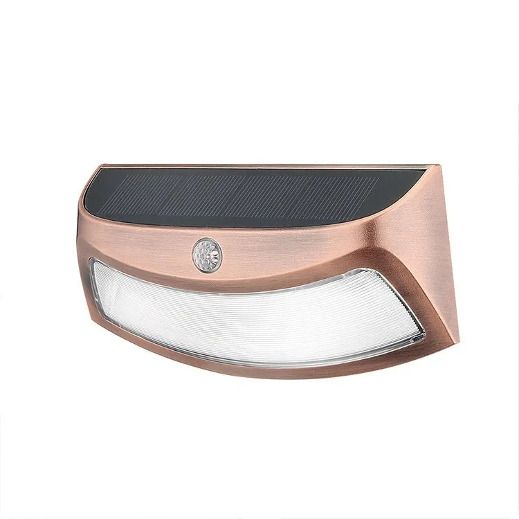 Solar-powered smiling face garden wall light with IP65 weather protection for outdoor courtyard and villa lighting