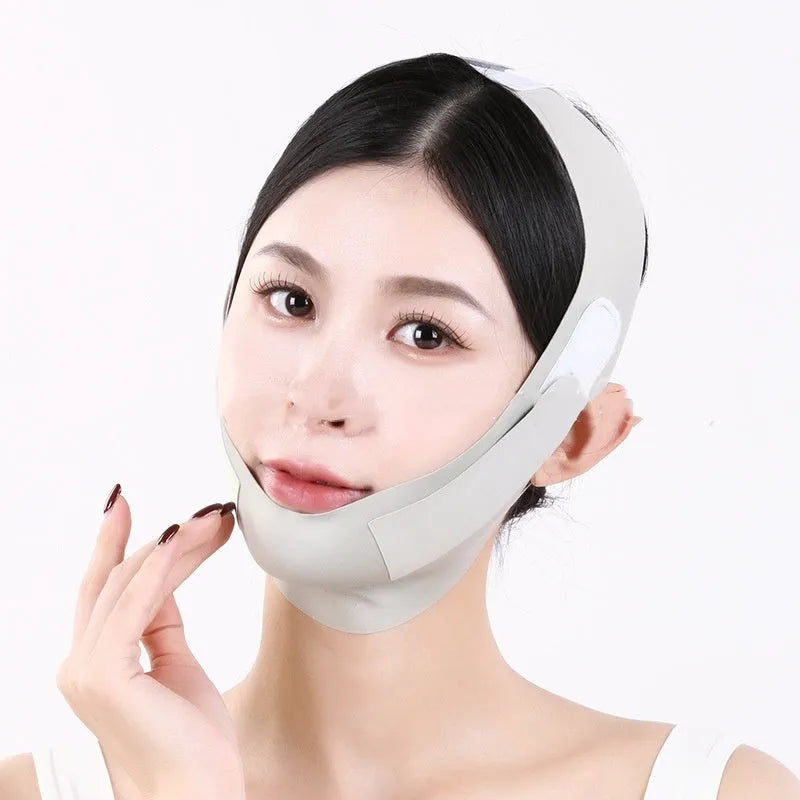 Graphene 9.0 face shaping mask in purple and green colours for facial lifting and tightening support