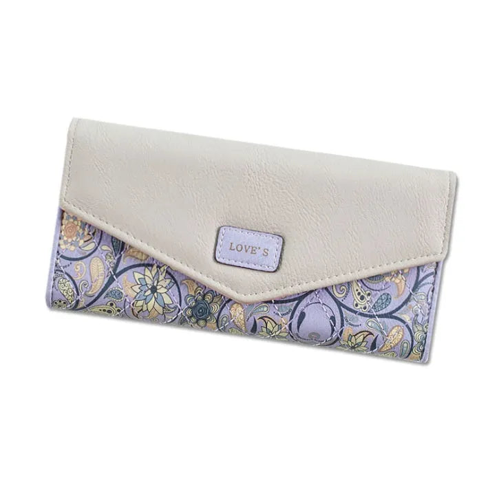 Open trifold women's wallet showing card slots and buckle closure in one of five colours.