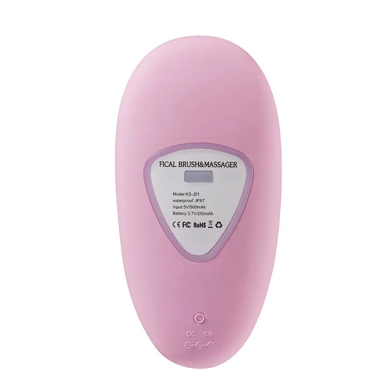 Mini electric facial cleansing brush with food-grade silicone brush head in pink, compact design on white background