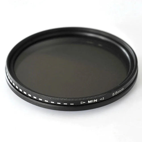 Adjustable camera ND filter kit with four density filters and a set of multi-diameter metal adapter rings.