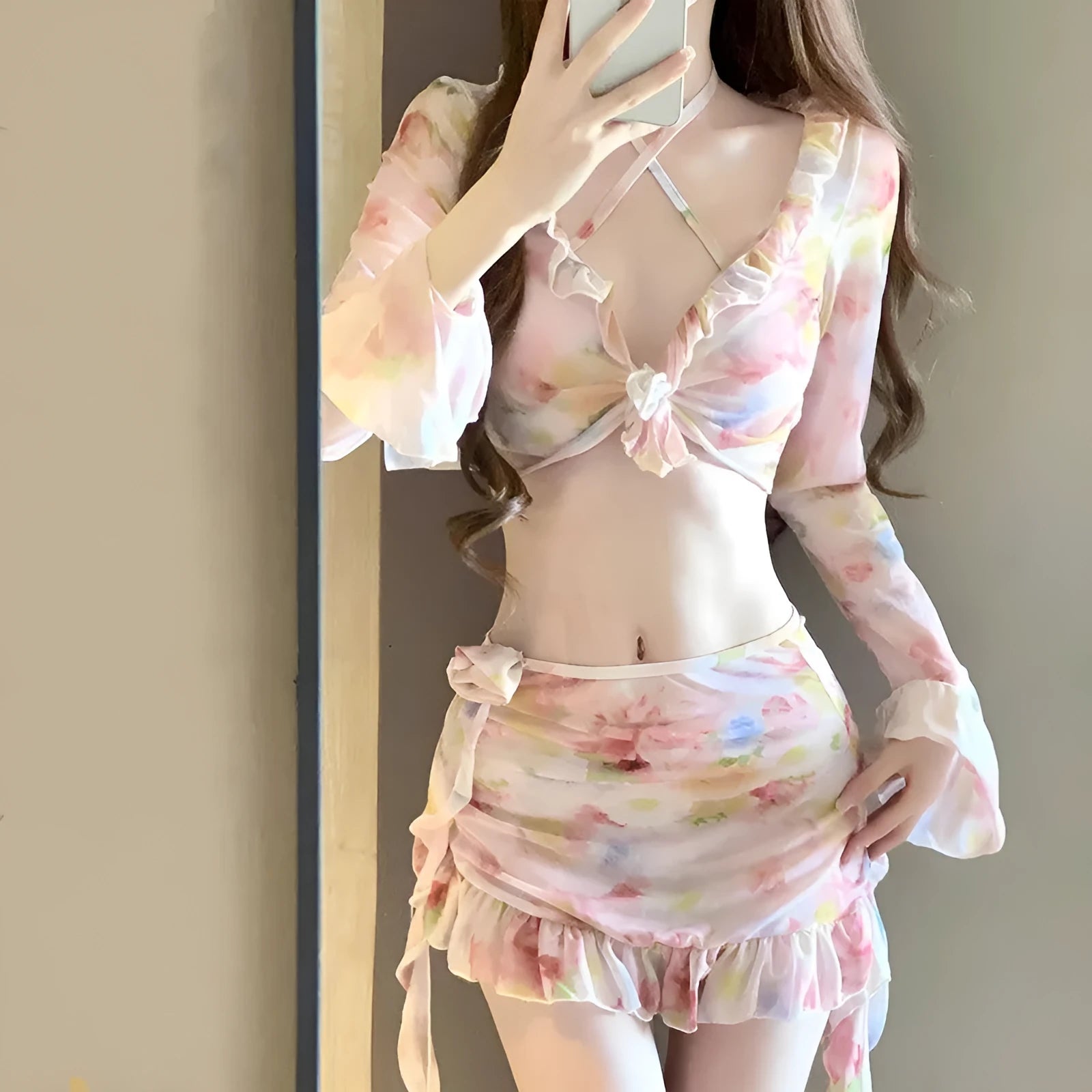 Women's cherry blossom pink floral bikini swimsuit set on a white background.