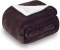 Grey and white USB electric heating blanket with intelligent temperature control on a sofa.