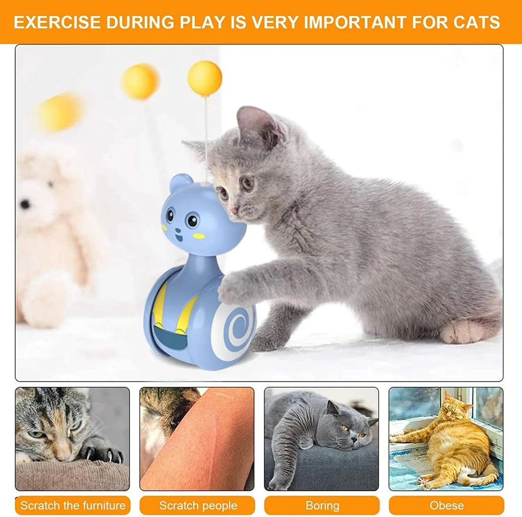 Interactive cat tumbler toy with rotating feather wand and ball attachments in pink and blue colour options