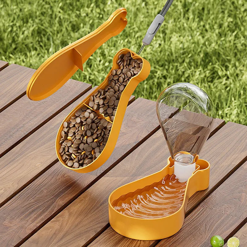 Orange and white portable pet water bottle with separate food container showing measurement scale