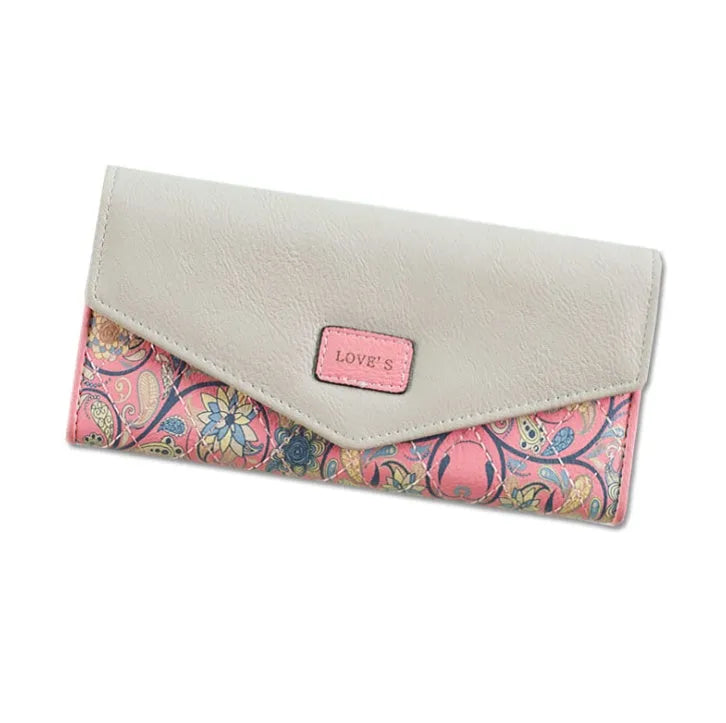 Open trifold women's wallet showing card slots and buckle closure in one of five colours.