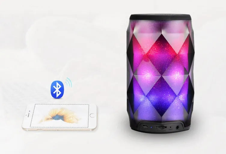 Black crystal diamond-cut Coke can shaped Bluetooth speaker with colourful lighting effects.