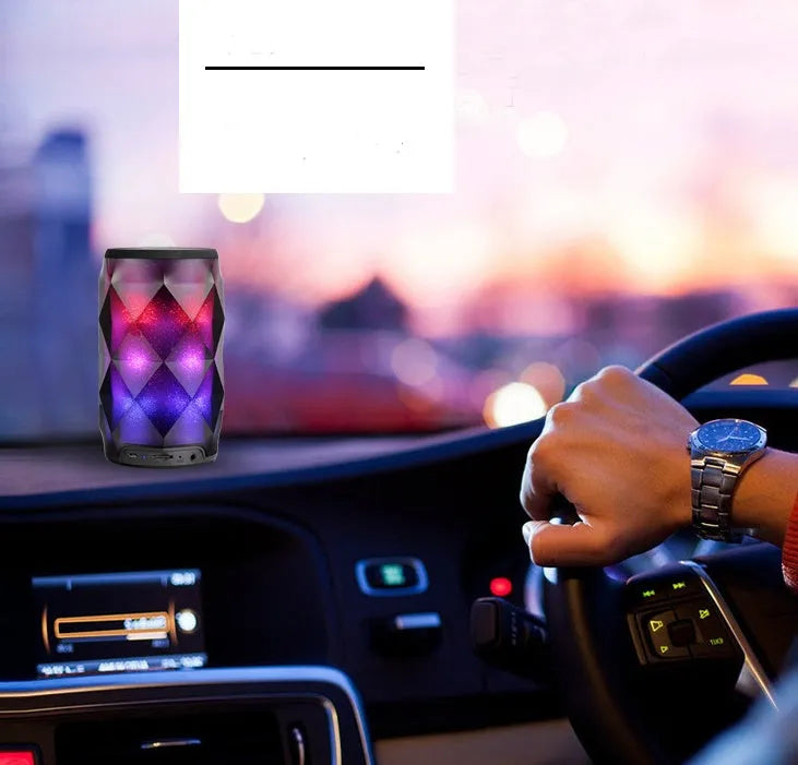 Black crystal diamond-cut Coke can shaped Bluetooth speaker with colourful lighting effects.