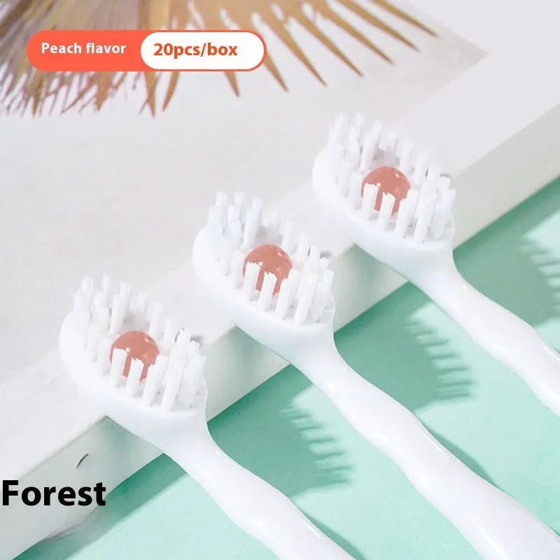 Box of 20 disposable bead travel toothbrushes in mint, peach, plum green tea and mixed flavours.