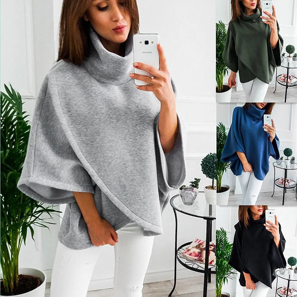 Women's extended length cardigan with bat sleeves and three-button placket in multiple colour options